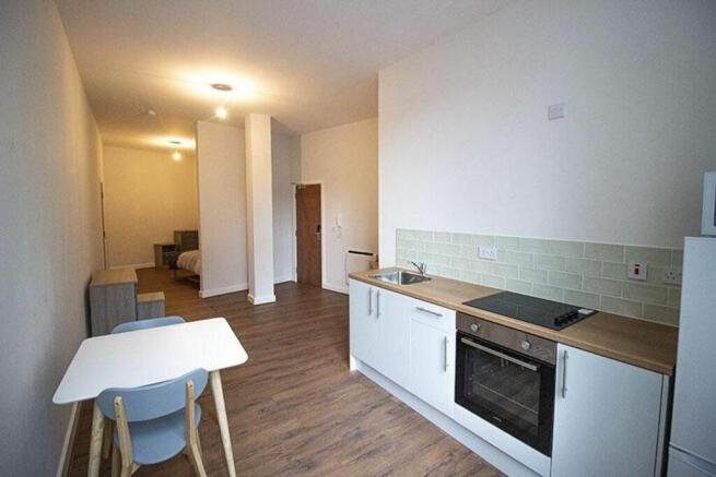 This charming kitchen area features modern appl...