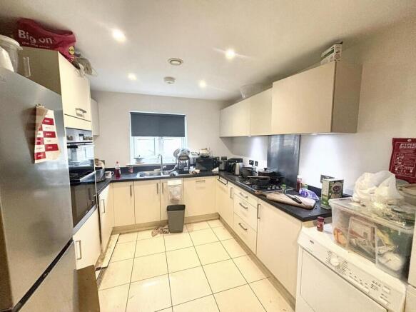 This modern kitchen features ample counter spac...