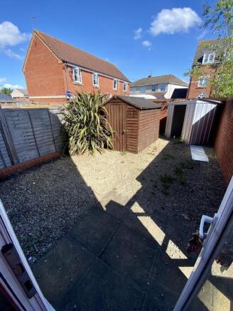 A charming garden space featuring a well-mainta...