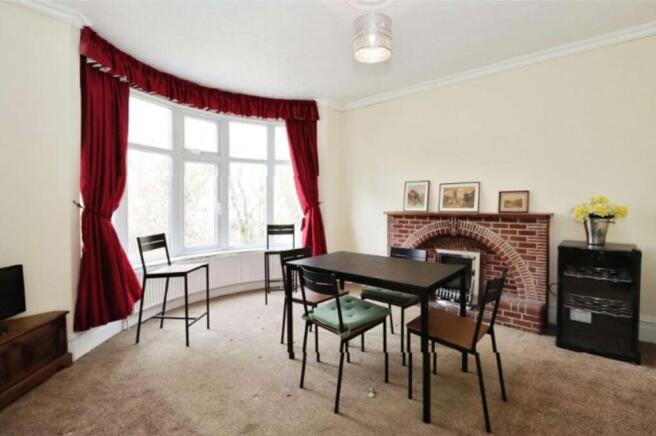 A beautifully bright and spacious living room f...
