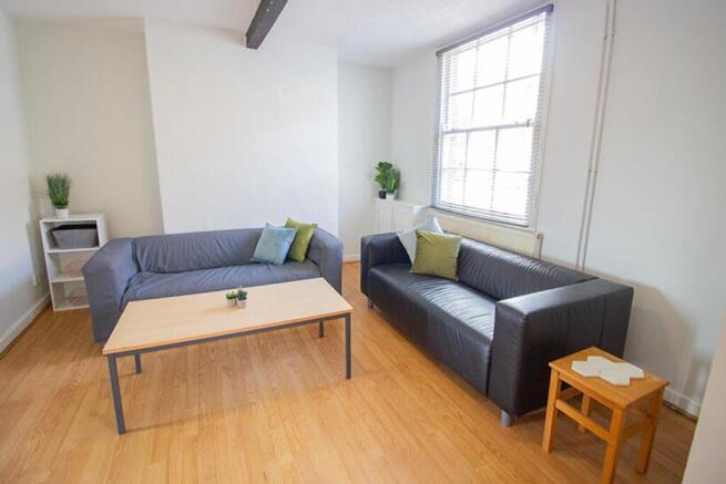 Bright and inviting living room featuring moder...