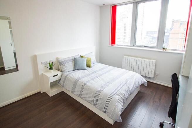 This beautifully designed double bedroom offers...