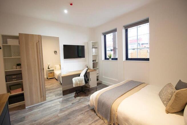 This beautifully designed double bedroom offers...