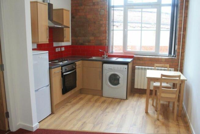Modern kitchen featuring a stylish design with ...