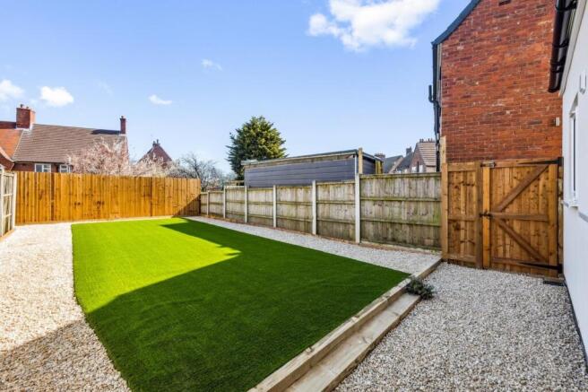 A beautifully maintained garden space featuring...