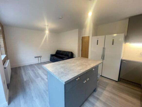 This inviting living area features ample space ...