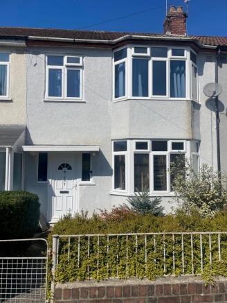 A charming front view of a well-maintained terr...