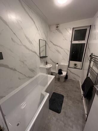 A beautifully designed bathroom suite featuring...