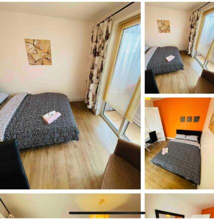 A beautifully designed double bedroom featuring...