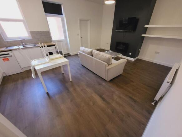 This inviting living room features a modern des...