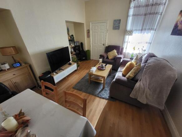 A cozy and inviting living room featuring comfo...