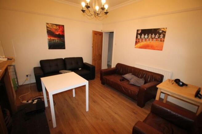 A cozy living room featuring comfortable seatin...