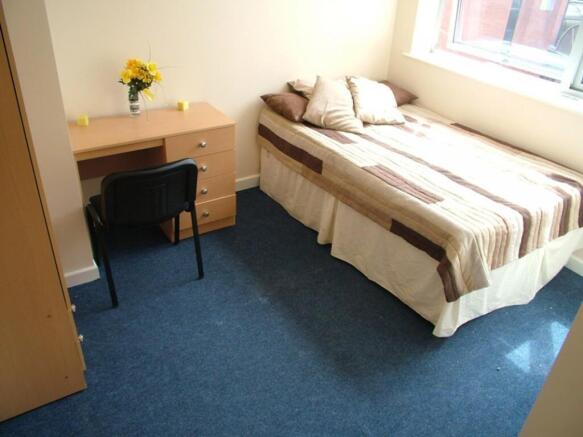 Bright and inviting double bedroom featuring a ...