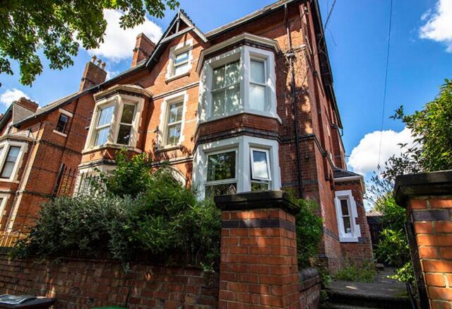 Charming front view of a beautifully maintained...