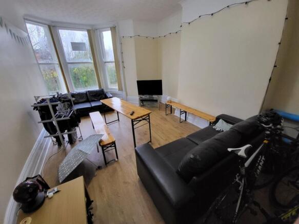 Spacious living room featuring ample seating an...