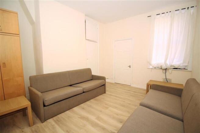 A cozy living room featuring comfortable seatin...