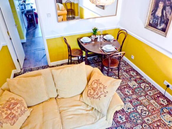 A bright and inviting living room with stylish ...