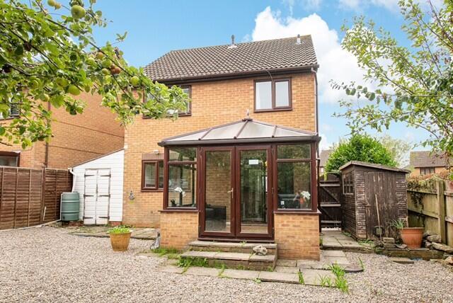 This charming garden space offers a serene esca...