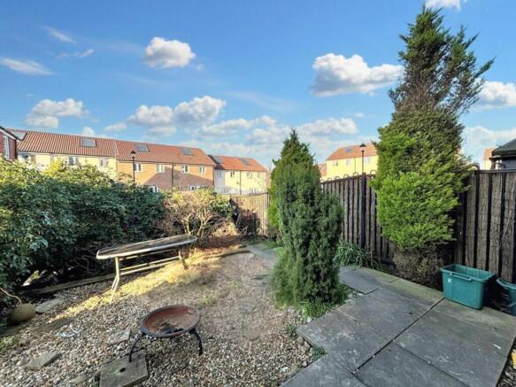 This charming garden offers a serene outdoor sp...
