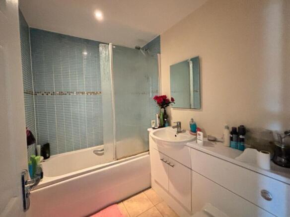 A beautifully designed bathroom suite featuring...