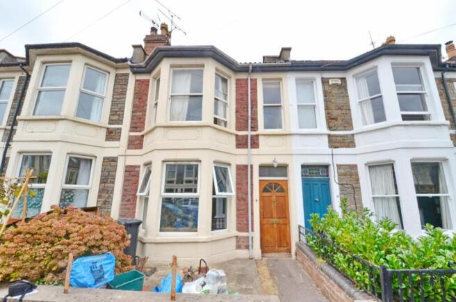 Charming front view of a classic terraced house...