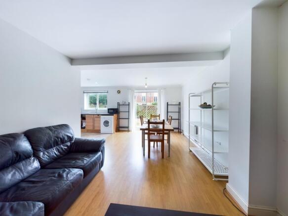 Bright and spacious living room featuring a com...