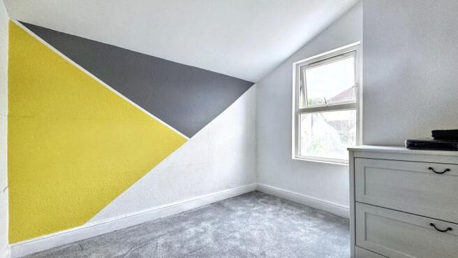 Bright and inviting double bedroom featuring a ...