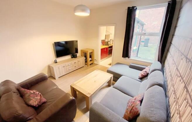 This inviting living room features comfortable ...