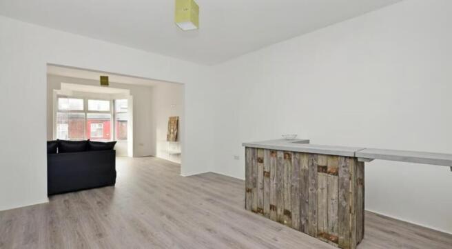 This inviting living room features a stylish wo...
