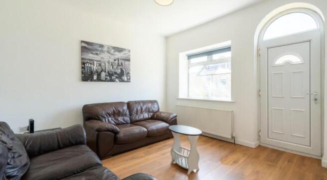 A stylish and inviting living room featuring co...