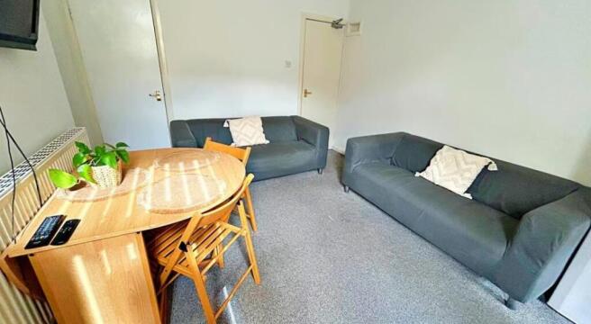 A cozy living room featuring two comfortable so...