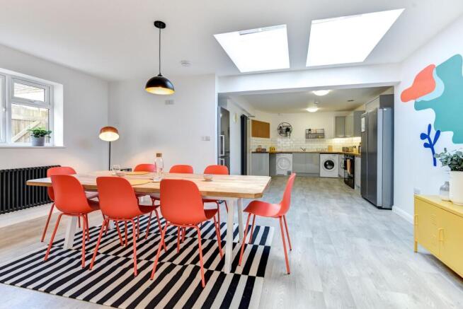 Bright and modern kitchen featuring a spacious ...
