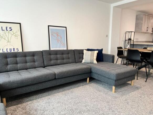 A stylish and inviting living room featuring a ...
