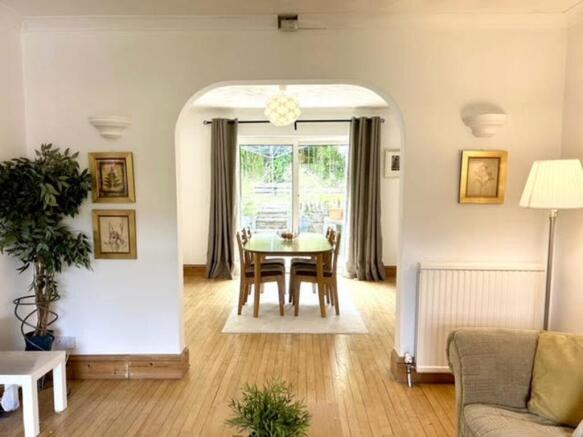 A spacious and inviting large modern living roo...