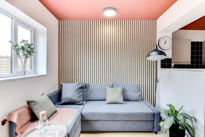 This stylish living room features contemporary ...