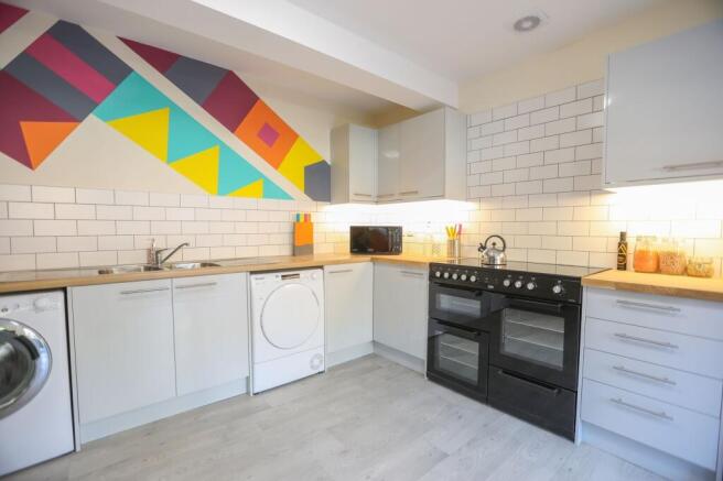 This vibrant kitchen features modern appliances...