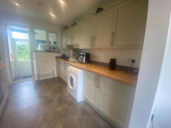 This modern kitchen features ample counter spac...