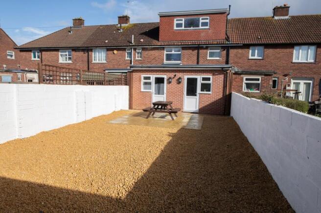 A spacious and well-maintained garden featuring...