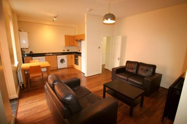 This inviting living room features a cozy seati...