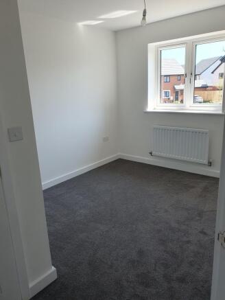 Bright and inviting double bedroom featuring am...