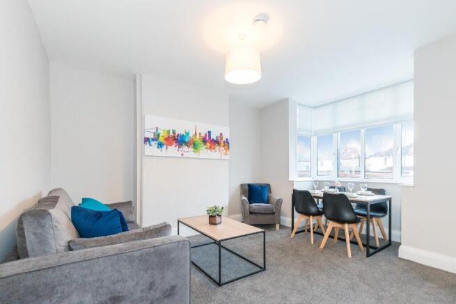 Bright and inviting living room featuring moder...