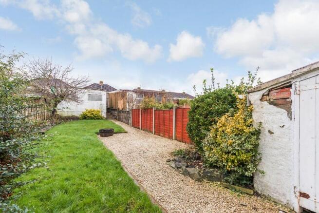 A beautifully maintained garden featuring lush ...
