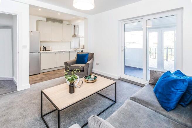 Bright and inviting living room featuring moder...