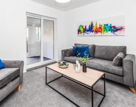 Stylish and inviting living room featuring mode...