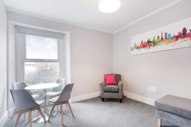 This modern living room features a bright and a...