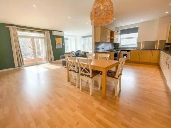 A beautifully designed living room featuring am...