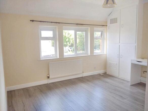 Bright and airy master bedroom featuring light ...