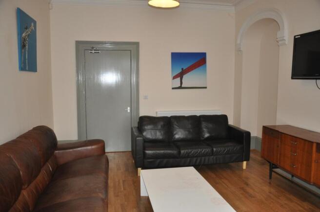 A spacious and inviting large modern living roo...