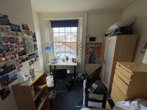 Bright and cozy double bedroom featuring large ...