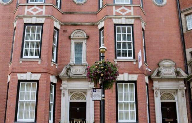 Elegant traditional brick-fronted terraced prop...